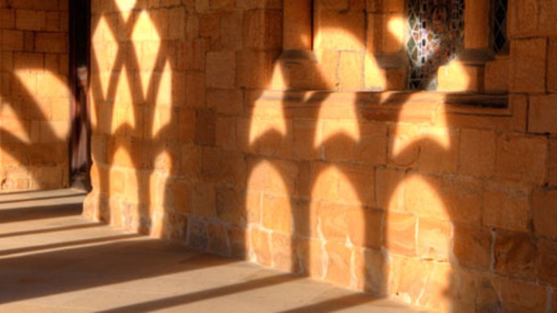 Shadows in a church cloister